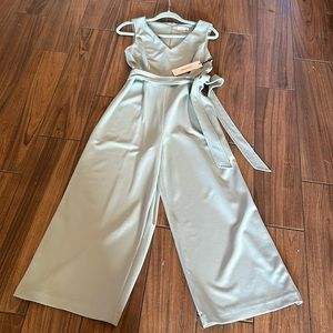Brand New with tag Calvin Klein pastel green jumpsuit size 4 gorgeous